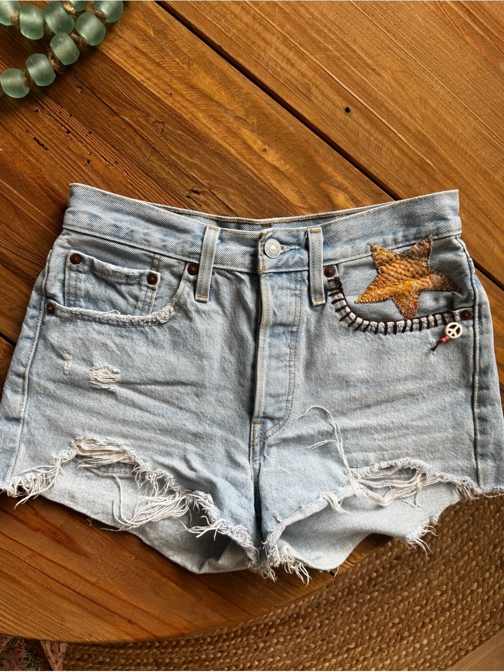 Levi's Light Blue Denim Shorts with Yellow Star Patches